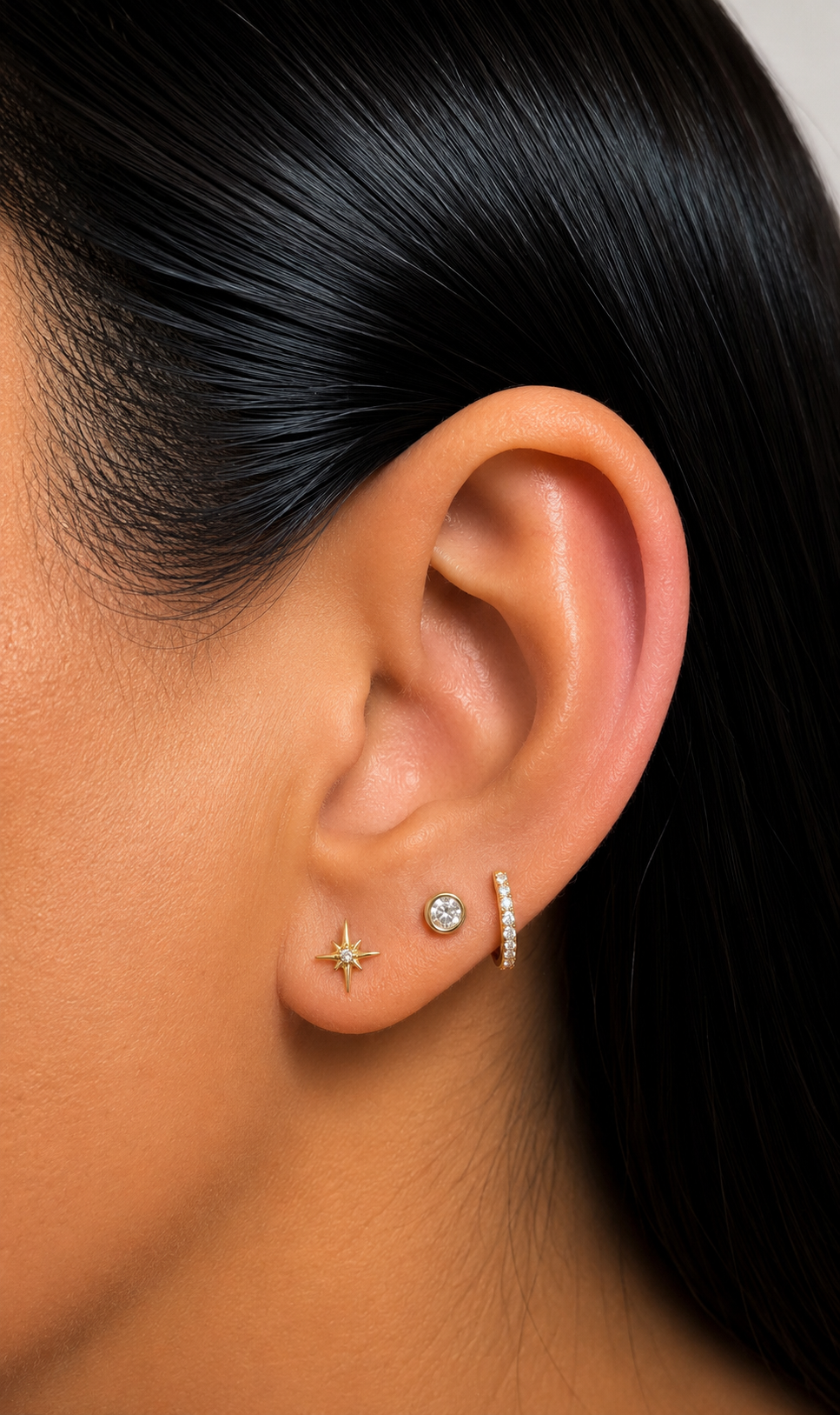 Stellar Spark - Centered Starbust CZ Gold PVD Flat Back Titanium